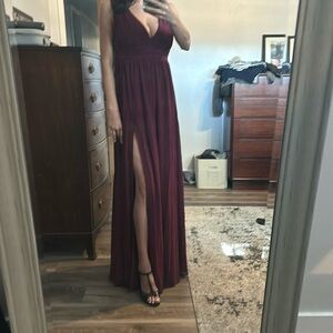 Long maroon dress with side slit. Worn once